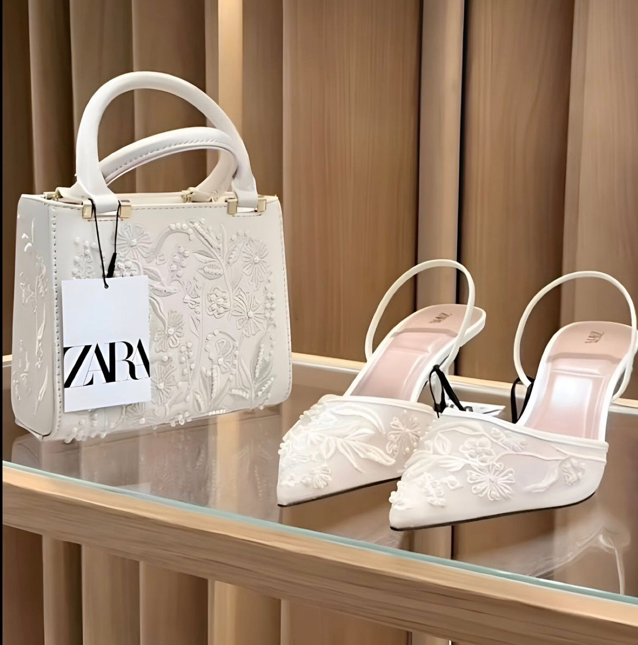 25003.8.pochette.zara